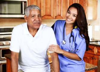 nurse assisting senior man 