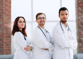 nurses posing while crossing their arms