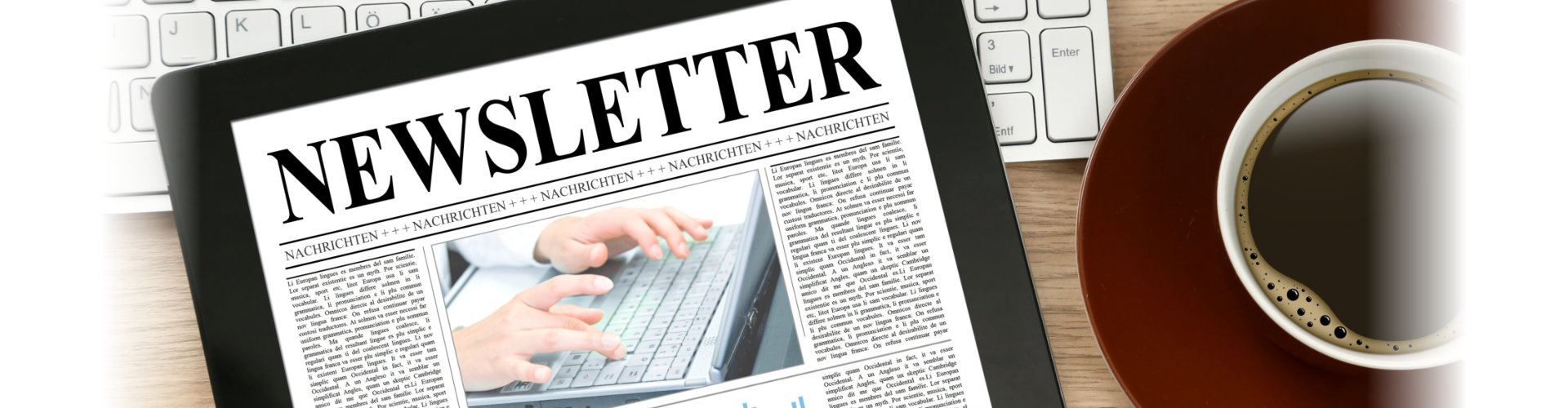 tablet with newsletter on the screen